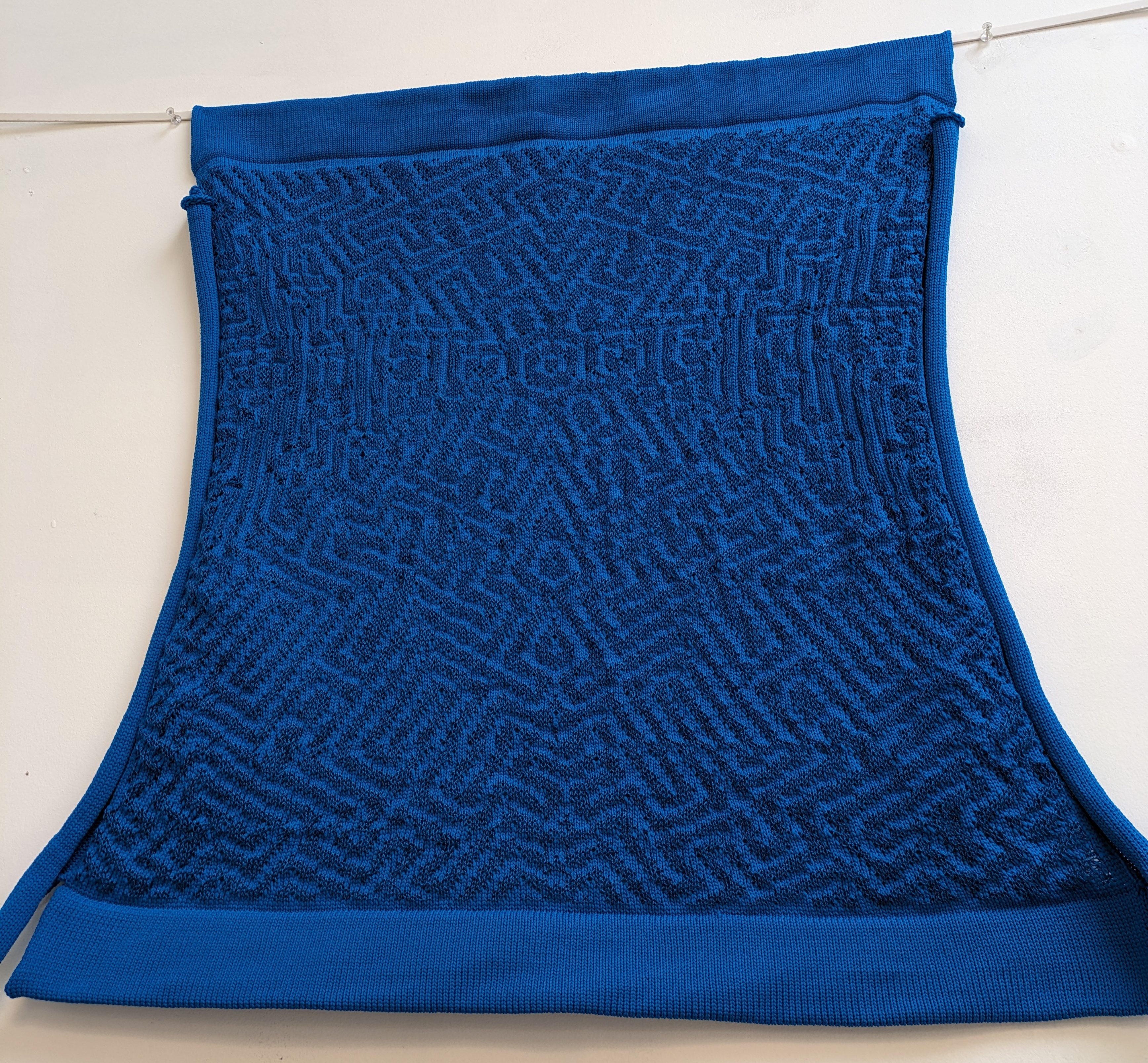 Dark blue teal shiny yarn textile wall art geometric symmetrical